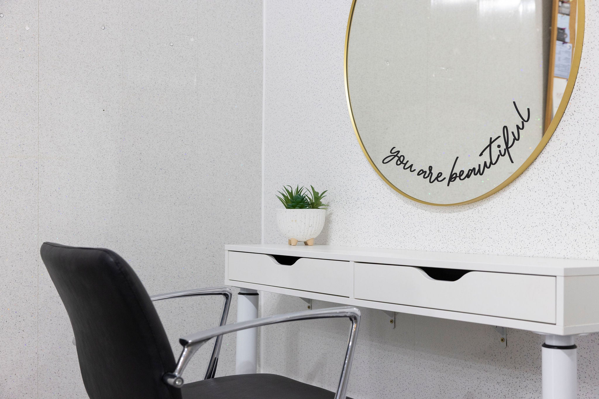 Professional hair stylist Claire working in her modern East Wittering salon